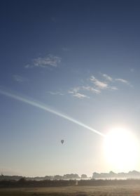 Scenic view of vapor trails in sky