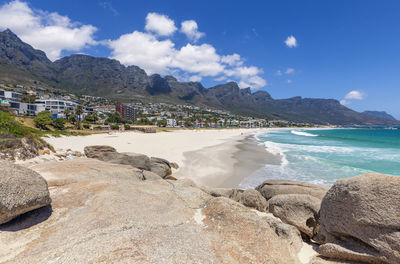 Panoramic view of camps bay beach and town suburb, cape town, south africa