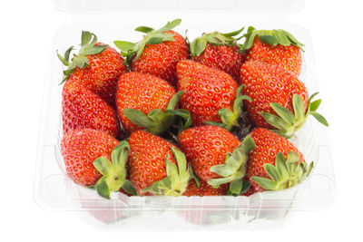 High angle view of strawberries on white background