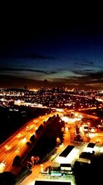 Illuminated cityscape at night