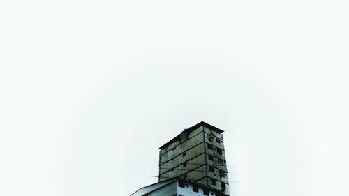 Low angle view of modern building against clear sky