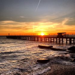 Scenic view of sea against sky during sunset