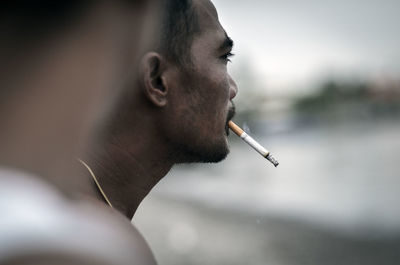 Close-up of woman smoking cigarette