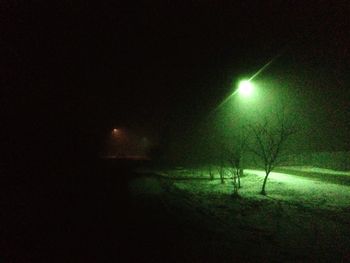 Illuminated street light at night