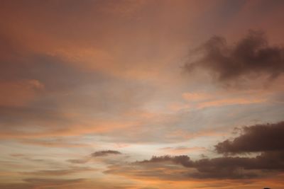 Low angle view of dramatic sky during sunset