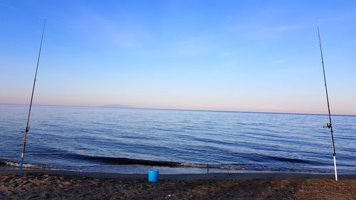 Scenic view of sea against blue sky