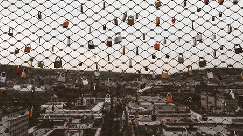 Aerial view of chainlink fence against sky