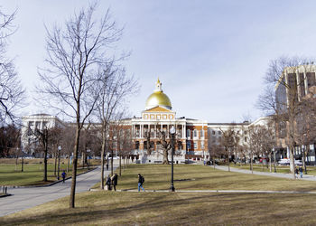 View of buildings in city against sky