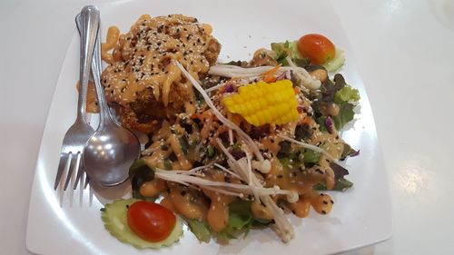 High angle view of meal served in plate on table