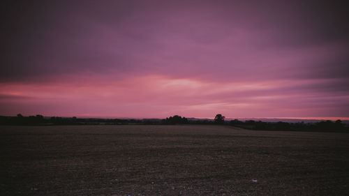 Scenic view of landscape against sky during sunset