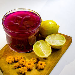 High angle view of fruits in glass on table