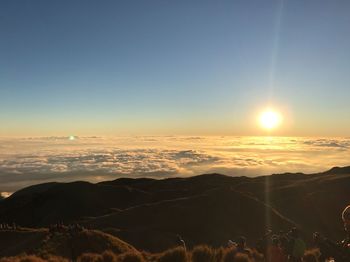 Scenic view of landscape against sky during sunset