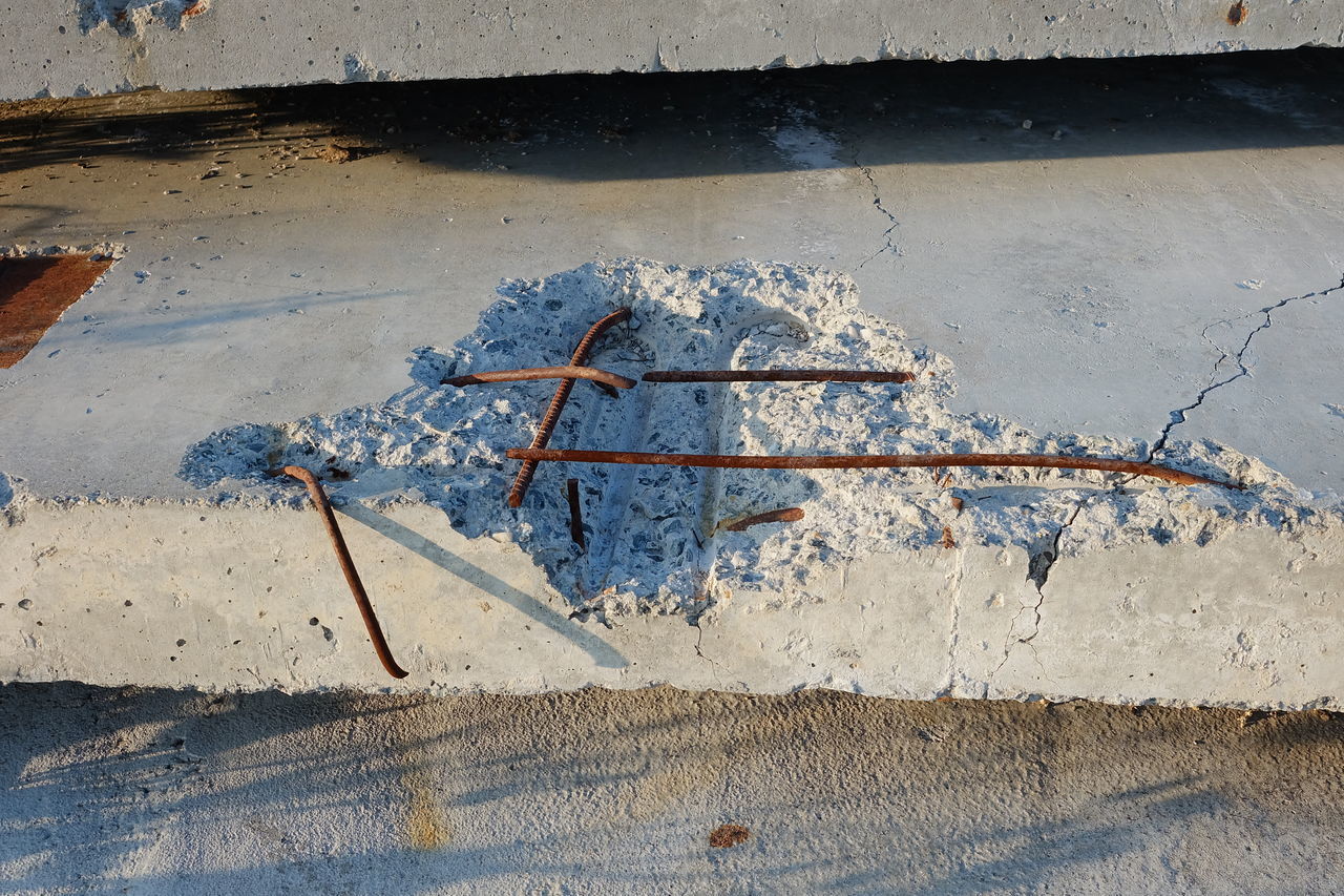 HIGH ANGLE VIEW OF RUSTY WALL