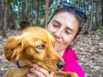 Portrait of woman with dog