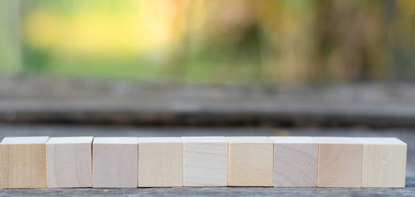 Close-up of wooden blocks on table