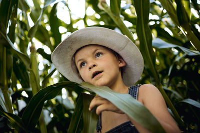 Portrait of cute boy wearing hat