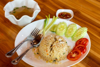 High angle view of breakfast served on table