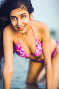 Sensual portrait of a beautiful woman on the beach.