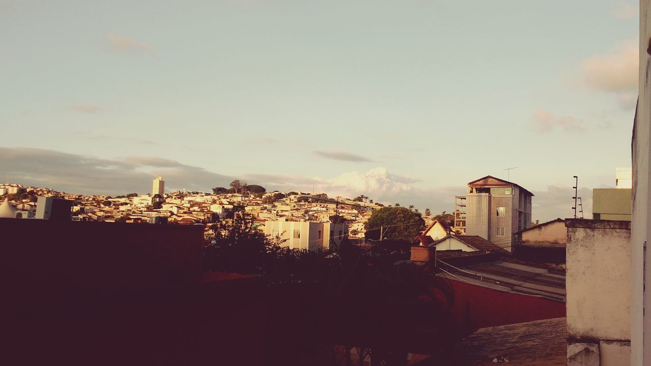 building exterior, architecture, built structure, city, sky, cityscape, residential building, cloud - sky, residential structure, sunset, building, residential district, dusk, cloudy, cloud, urban skyline, silhouette, tower, no people, skyscraper