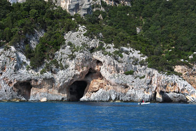 Scenic view of rock formation in sea