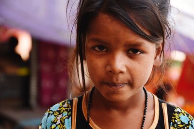 Close-up portrait of smiling girl