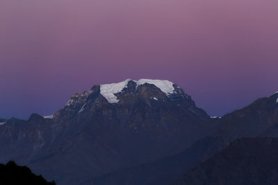 Scenic view of mountains against sky during winter