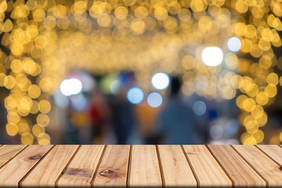 Close-up of illuminated lights on table