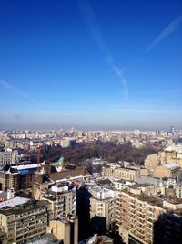 Cityscape against blue sky