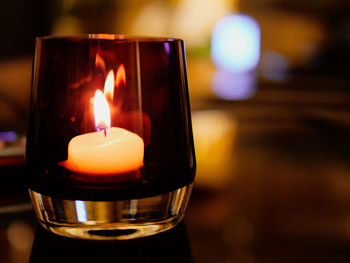 Close-up of burning candle
