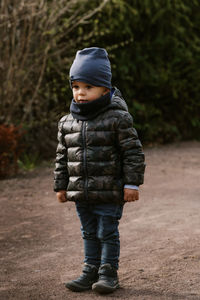 Full length of boy standing outdoors