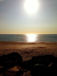 Scenic view of sea at sunset
