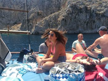 People relaxing at beach