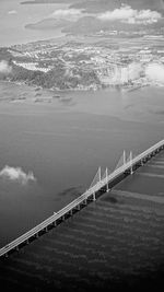 High angle view of bridge over sea against sky