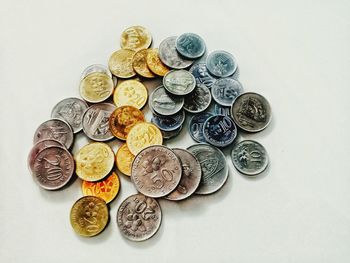 High angle view of coins