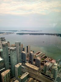 High angle view of buildings in city, cn tower, toronto, canada