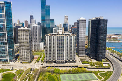 Modern buildings in city against sky