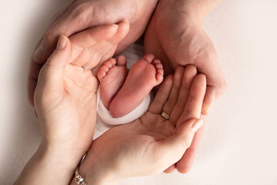 Cropped image of mother holding baby