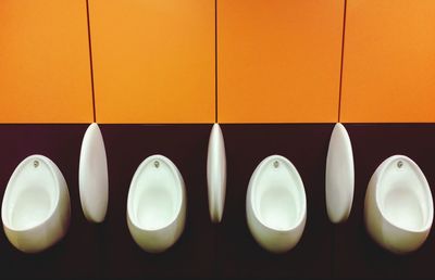 Four public urinals