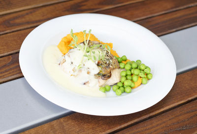 High angle view of salad in bowl on table