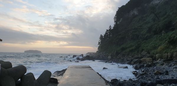 Scenic view of sea against sky during sunset