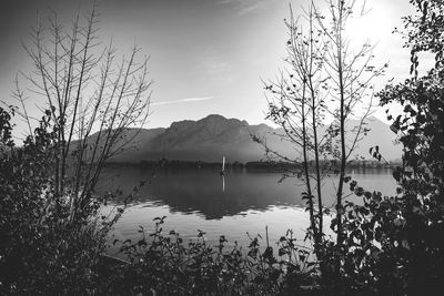 View of lake and mountains against sky