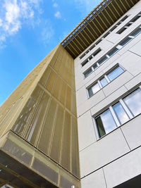 Low angle view of modern building against sky