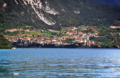 Aerial view of townscape by sea