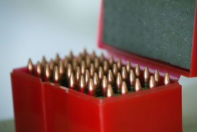Close-up of bullets in container