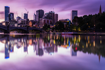 Reflection of illuminated city at night