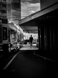 Full length of woman walking in city