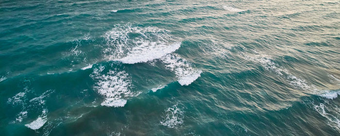 Stormy ocean water surface. aerial view of foamy sea waves