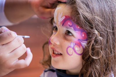 Close-up portrait of a girl with face