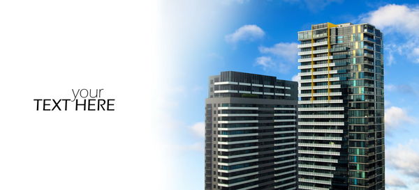 Low angle view of modern buildings against sky