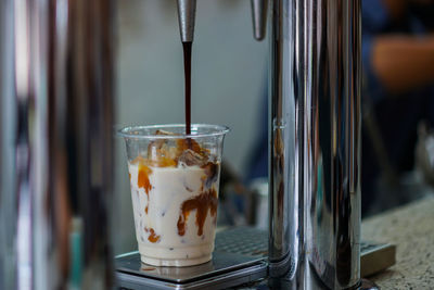 Close-up of coffee served on table